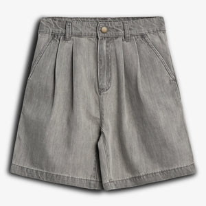 Gray denim shorts lay flat, featuring pleats and side pockets, with a button and zip closure. The background is plain white.