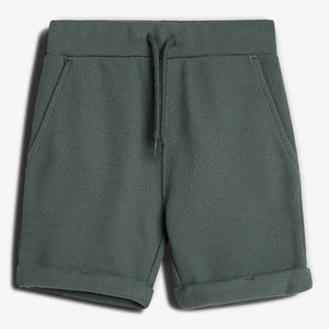 Dark green textured shorts with a drawstring waistband and two front pockets, contextually placed against a plain white background.