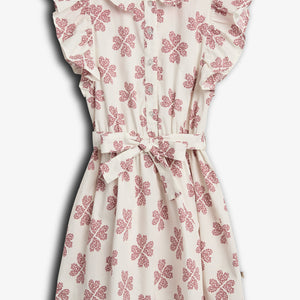 Dress with red floral patterns and buttons, featuring ruffled sleeves and a tie around the waist. Positioned against a plain white background.