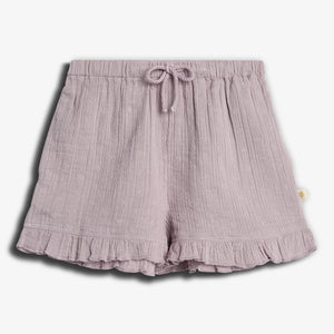 Lilac-colored textured shorts have a drawstring waistband, small floral patterns, and ruffled hems, displayed against a plain white background.