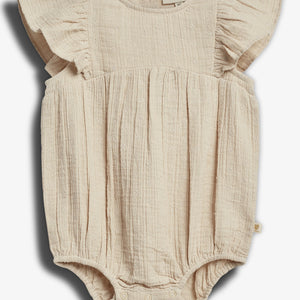 A beige baby romper features ruffled sleeves and a floral pattern. It has a round neck, gathered fabric, and snap closures at the bottom. The tag reads "PaMa_Lini."