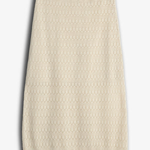 A beige, knee-length knit skirt features a geometric lace pattern, displayed flat against a plain white background.
