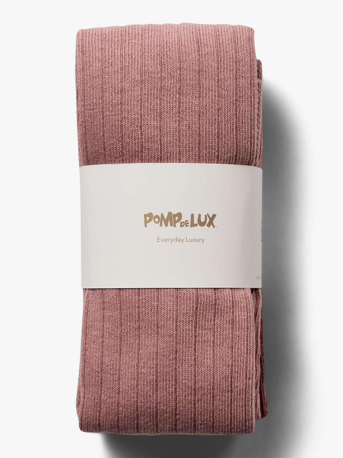 Folded pink knit fabric wrapped in a white band, with text "POMPdeLUX Everyday Luxury" against a plain white background.