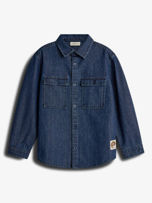 A blue denim shirt with long sleeves and a button-down front displayed against a plain white background. It features two chest pockets and a small label with "p" and "populus."